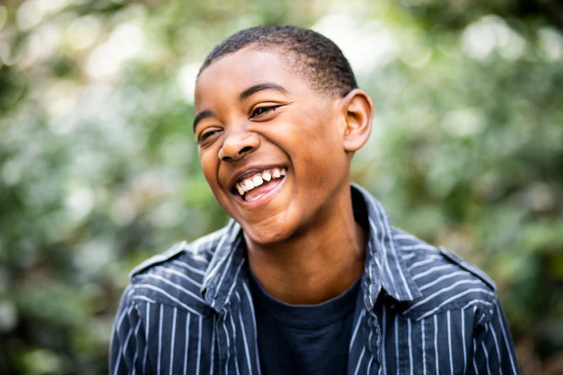 Smiling boy outdoors